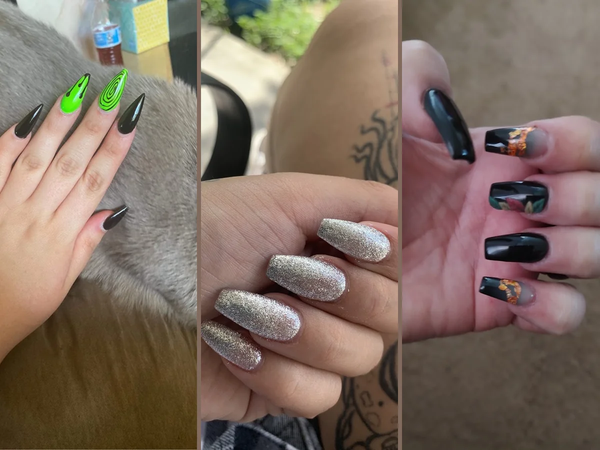 Manicured hands beside polish bottles.